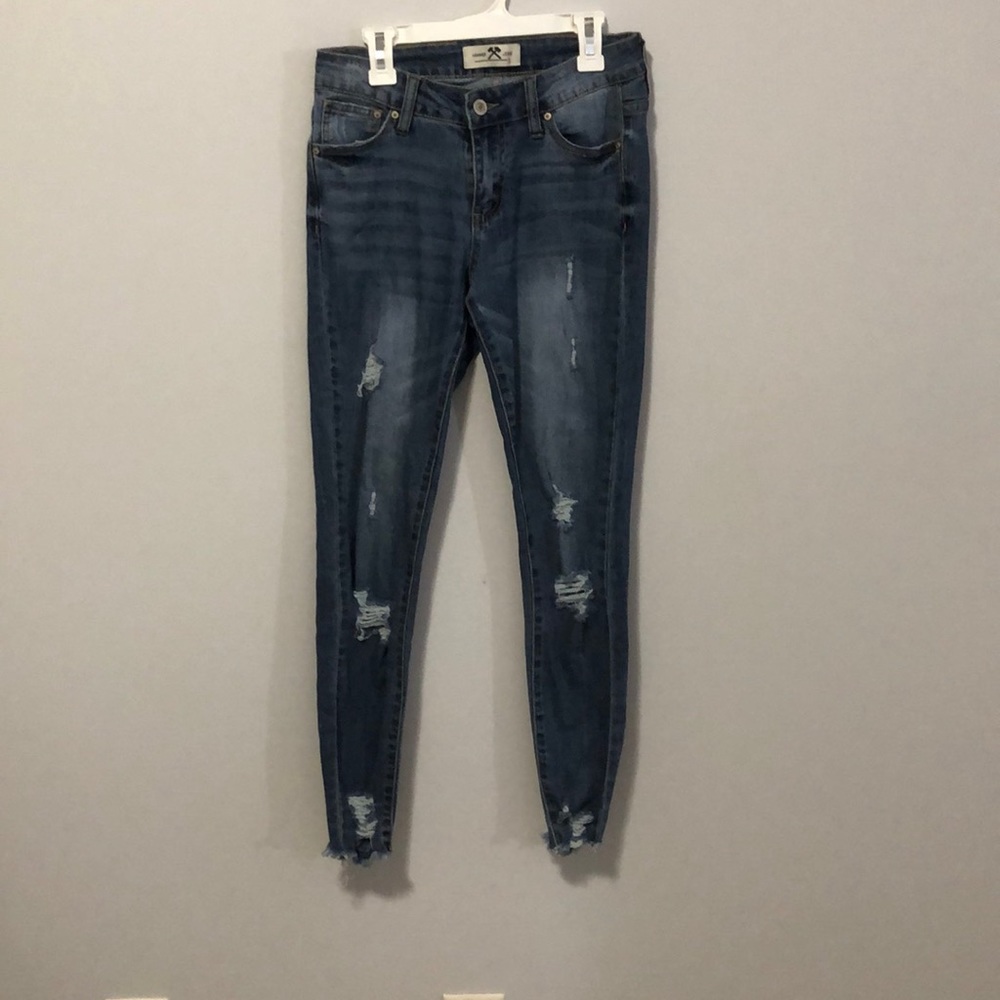 Mid-Rise distressed skinny jeans